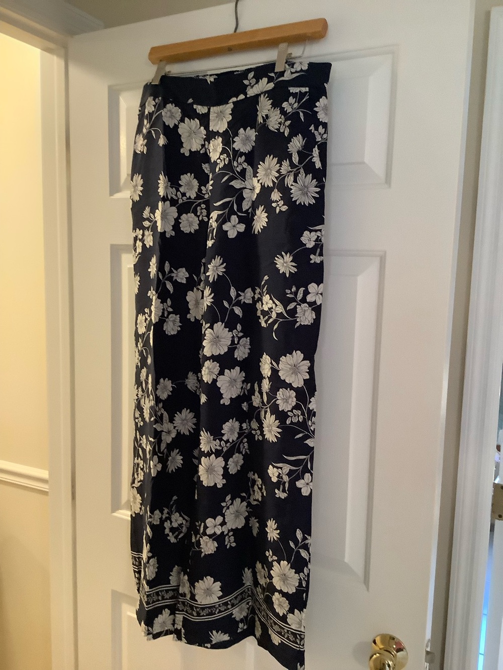 LOFT navy wide leg pants with White Floral Print.
